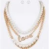 Social Butterfly Collection LOVE Gold Pearl Three Strand Necklace