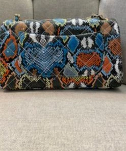 Social Butterfly Collection Blue Orange Snake Print Optional Strap Handbag